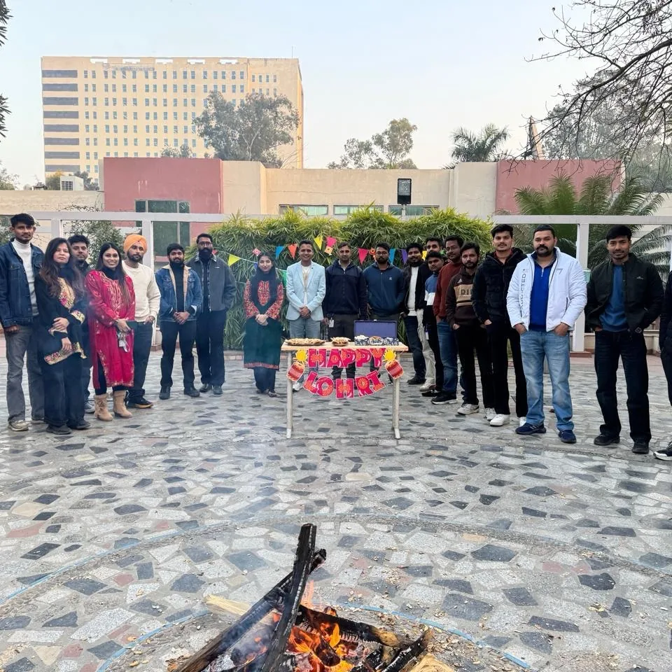 The Anviam team celebrating Lohri around a bonfire